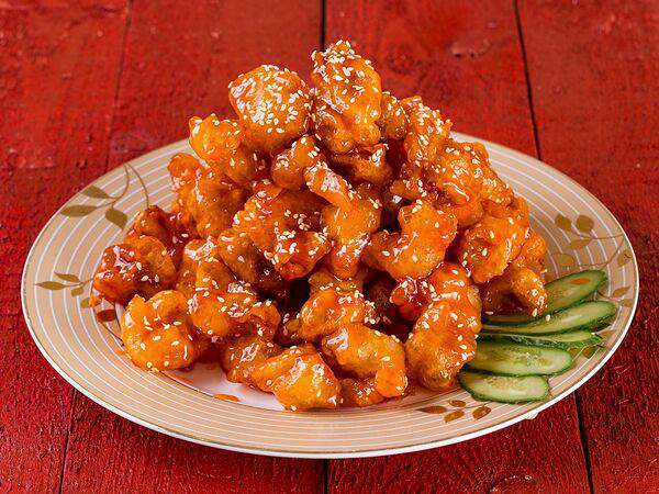 Девять драконов - Тушеная свинина в кисло-сладком соусе