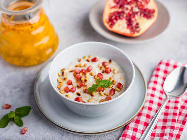 Apollo café - Овсяная каша с гранатом и кедровыми орехами