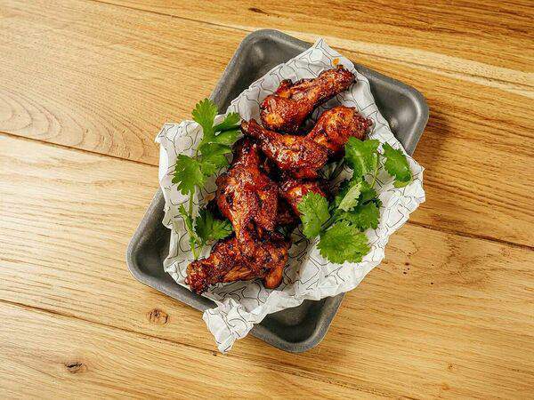 Брюссель - Куриные крылья в кисло-сладком соусе