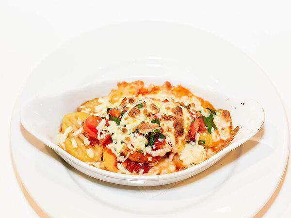 Траттория пицца - Ньокки с томатным соусом, запеченные под сыром