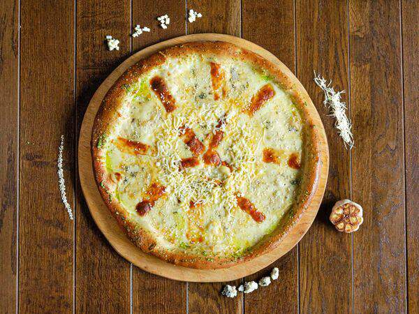 Pizza il gusto - Пицца Кватро