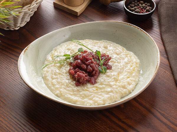 L'angolo Italiano - Ризотто Пармиджано с тартаром из говядины