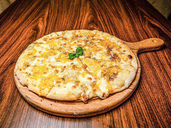 Пармеzан - Пицца Четыре сыра