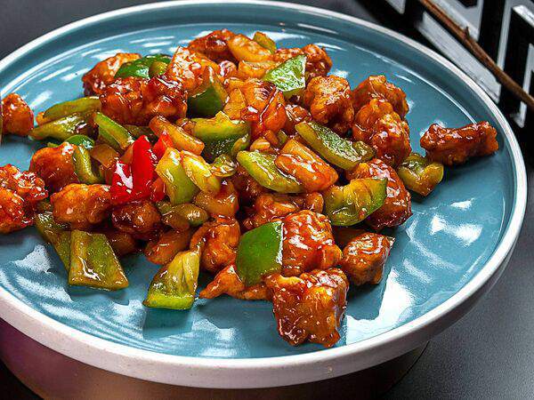 Сhino - Филе свинины в крахмале с ананасами в кисло-сладком соусе