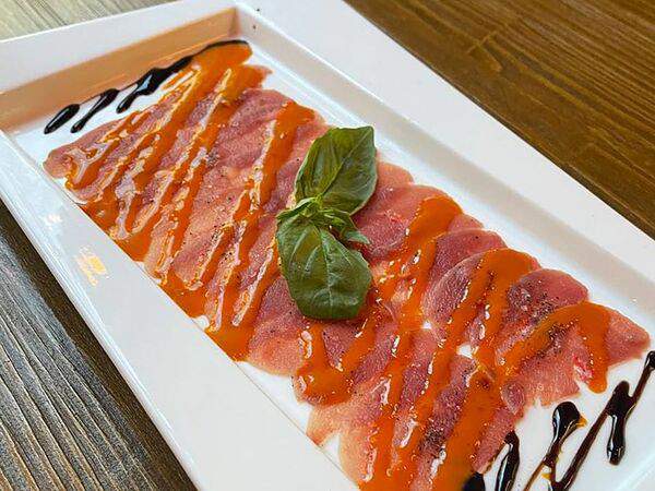 Praslin - Карпаччо из утки под облепиховым соусом