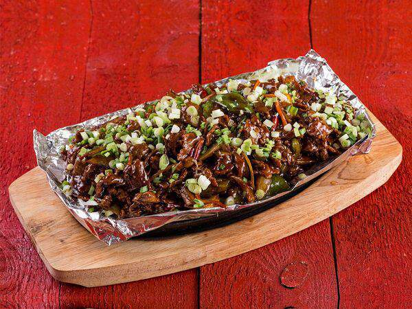 Девять драконов - Говядина на шипящей сковороде